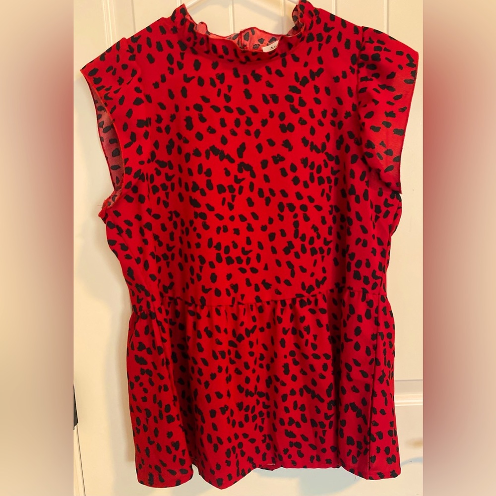 Animal print cap sleeve ruffle neck loose babydoll blouse.